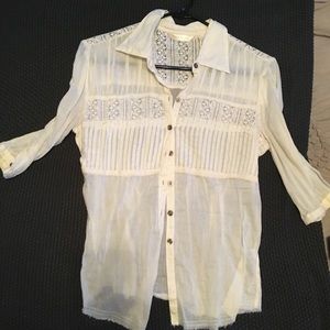 Cream vintage style blouse from the Buckle